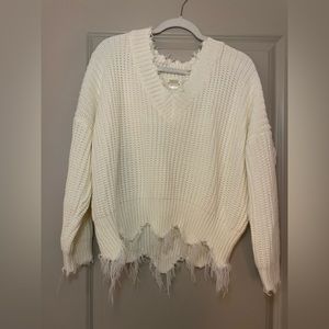 White distressed sweater